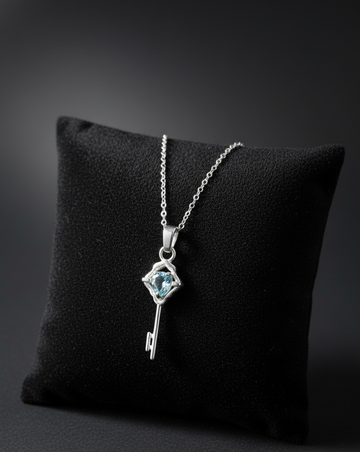 Blue Topaz Pear-Cut Solitaire Key Pendant