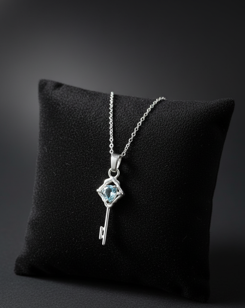 Blue Topaz Pear-Cut Solitaire Key Pendant